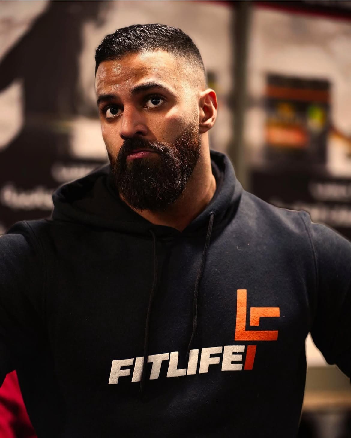 Abdallah Al-Taweel, FitLife Gym founder full-body portrait